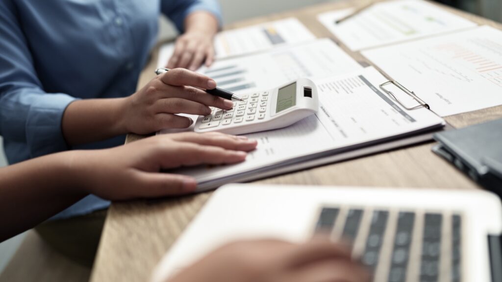 audit accountant calculating invoice and tax, Financial concept.