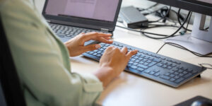 Close up of a businesswoman using computer